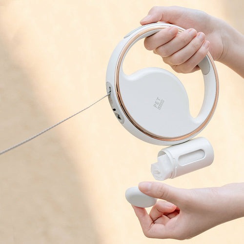 Automatic lighting retractable dog leash with LED night light and garbage bag holder in white color